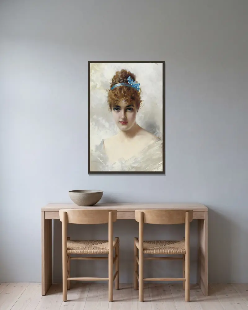 Porträtt av en ung kvinna i vitt av Vittorio Matteo Corcos inramad på en vägg