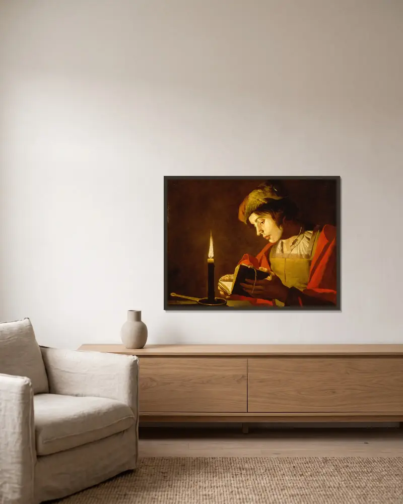A Young Man Reading by Candlelight av Matthias Stom inramad på en vägg