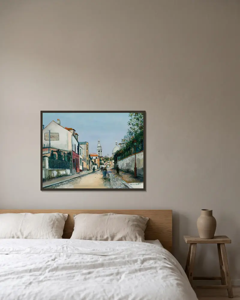 Rue de l’Abreuvoir à Montmartre av Maurice Utrillo inramad på en vägg