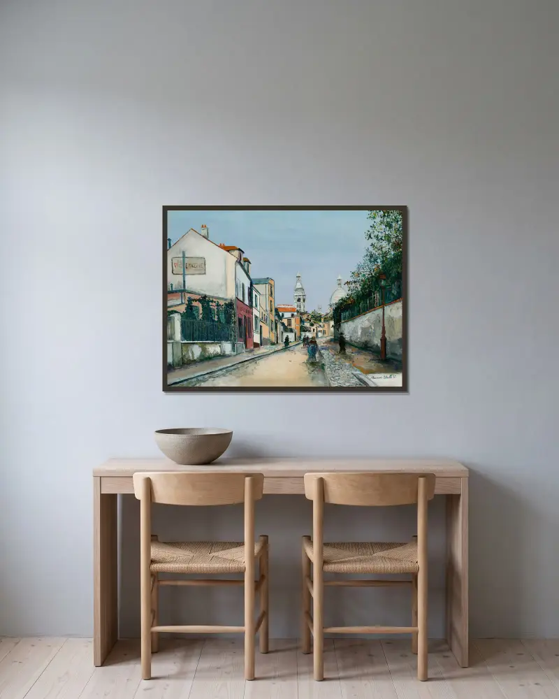 Rue de l’Abreuvoir à Montmartre av Maurice Utrillo inramad på en vägg