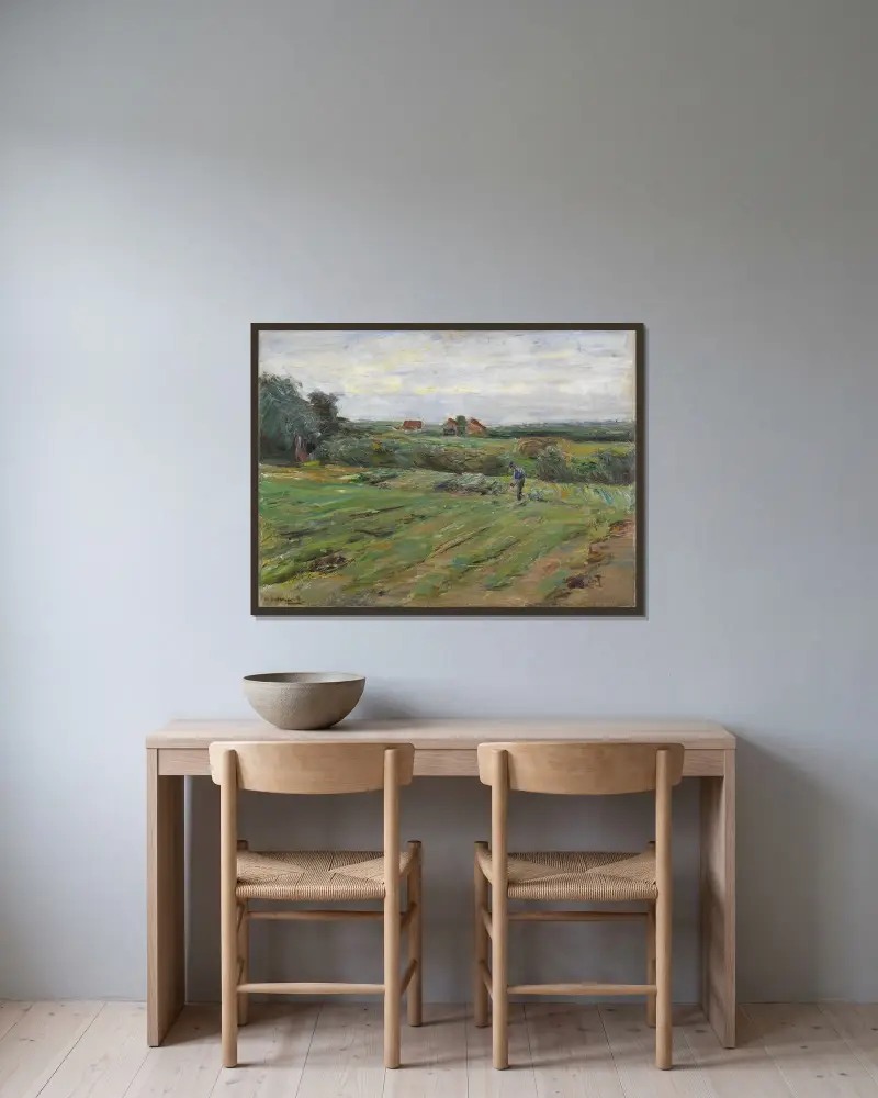 Skördefält av Max Liebermann inramad på en vägg