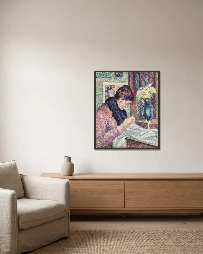 Nähende Frau von Maximilien Luce gerahmt an einer Wand