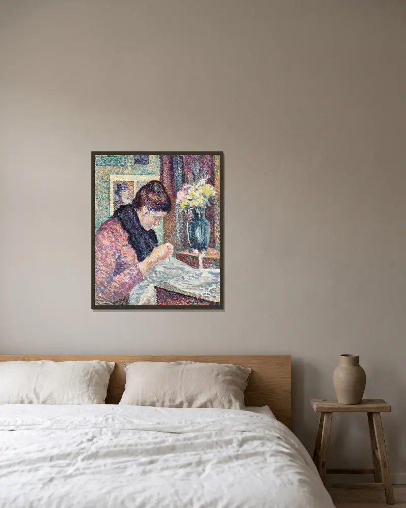Nähende Frau von Maximilien Luce gerahmt an einer Wand