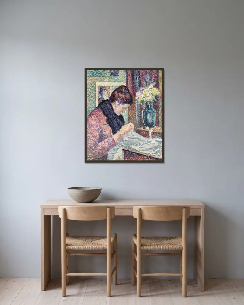Nähende Frau von Maximilien Luce gerahmt an einer Wand