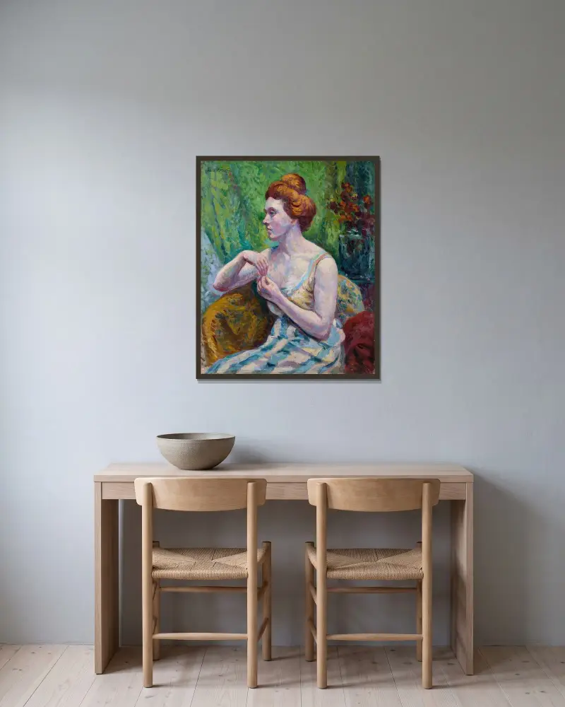 Frauenporträt von Maximilien Luce gerahmt an einer Wand