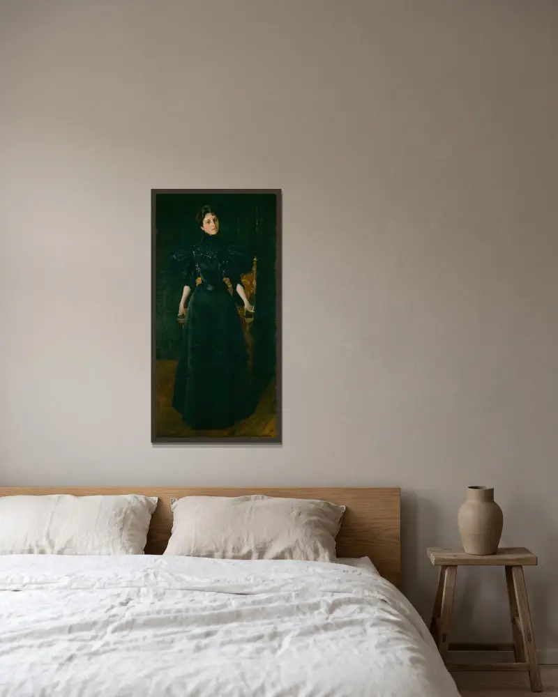 Porträtt av en dam i svart av William Merritt Chase inramad på en vägg