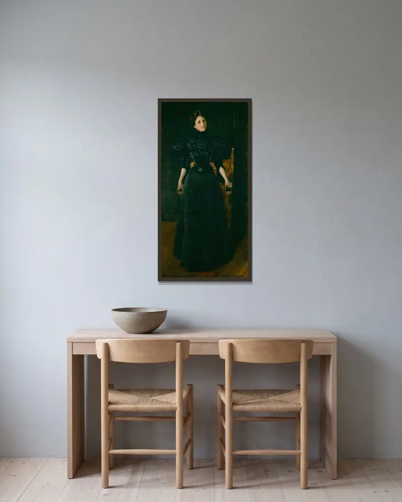 Porträtt av en dam i svart av William Merritt Chase inramad på en vägg