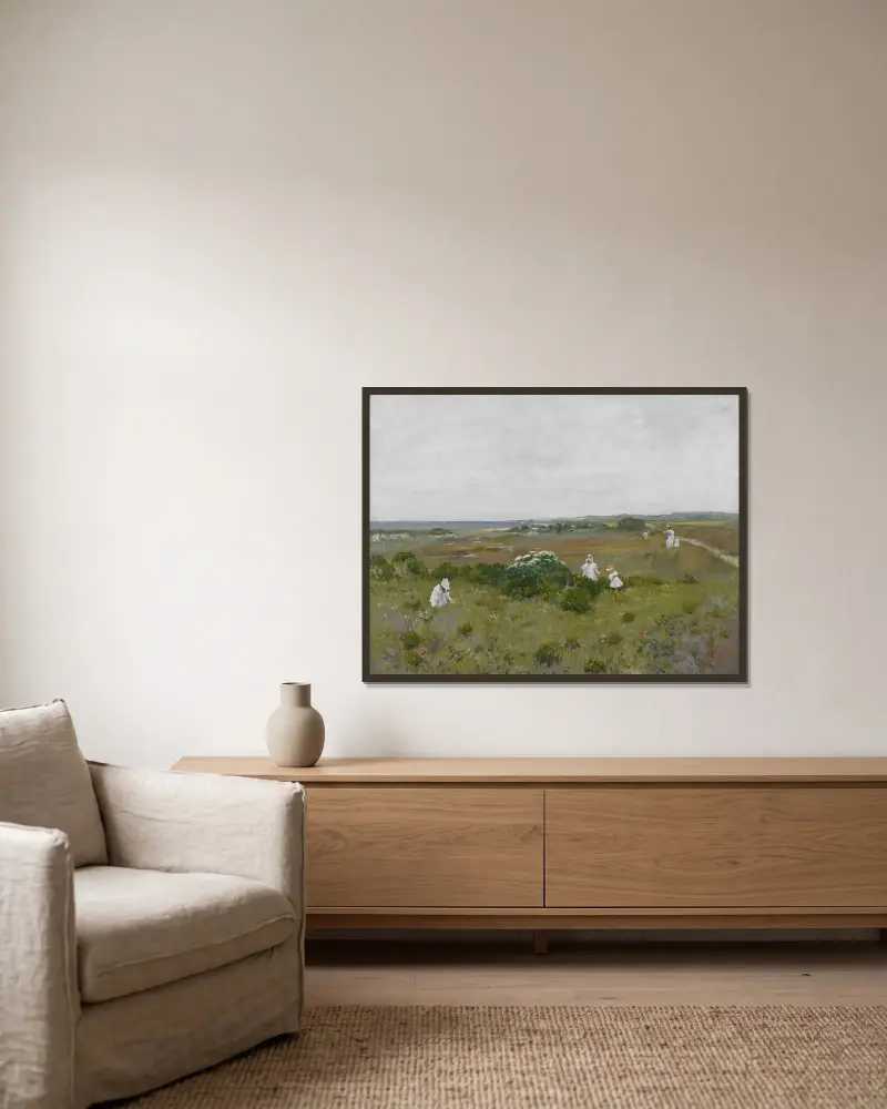 Blommor vid havet av William Merritt Chase inramad på en vägg