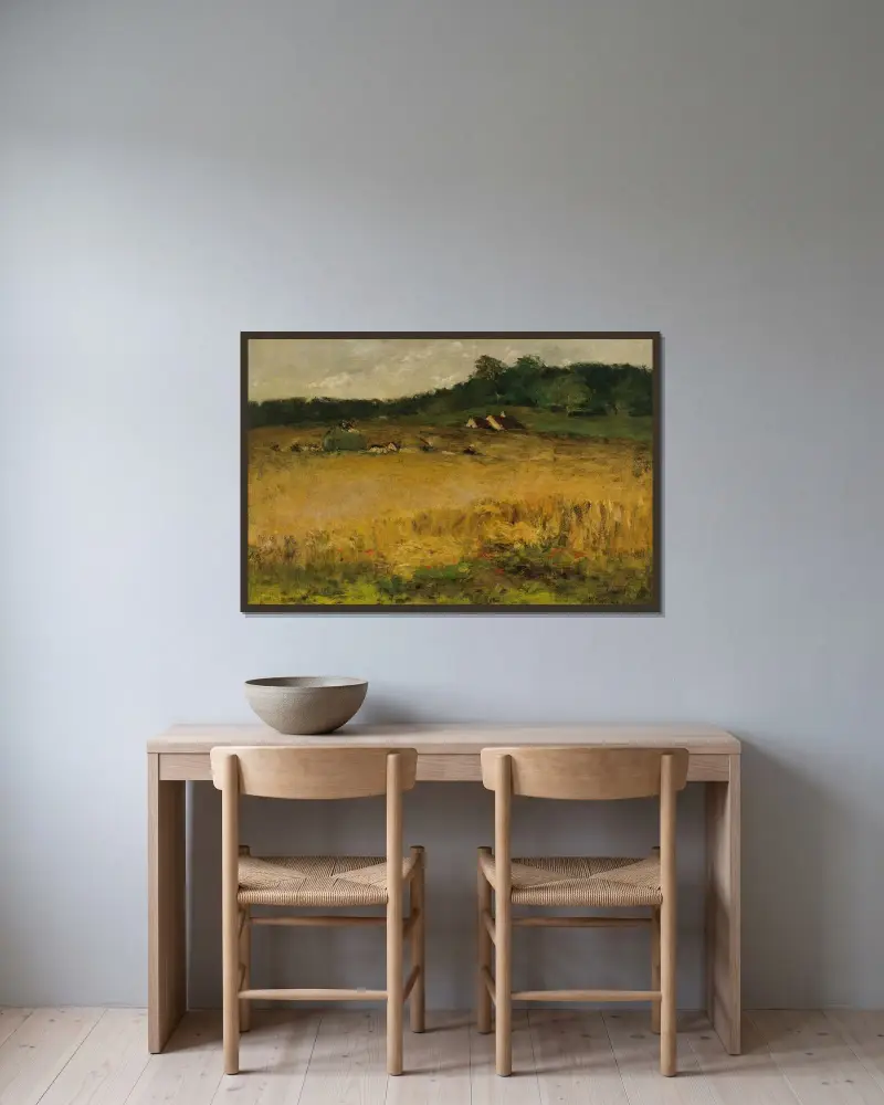 Vetefält av William Merritt Chase inramad på en vägg