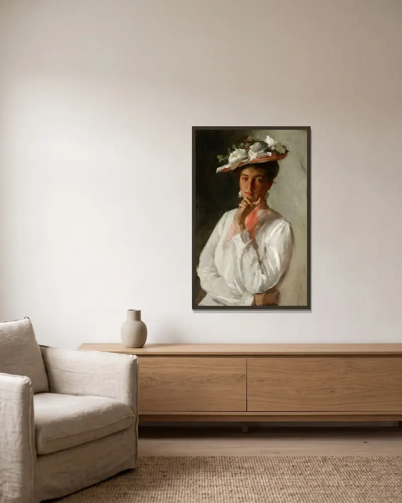 Frau in Weiß von William Merritt Chase gerahmt an einer Wand