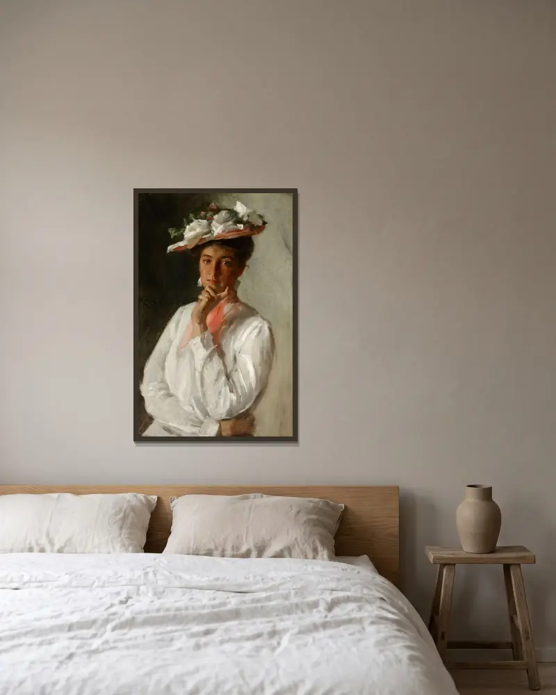 Frau in Weiß von William Merritt Chase gerahmt an einer Wand