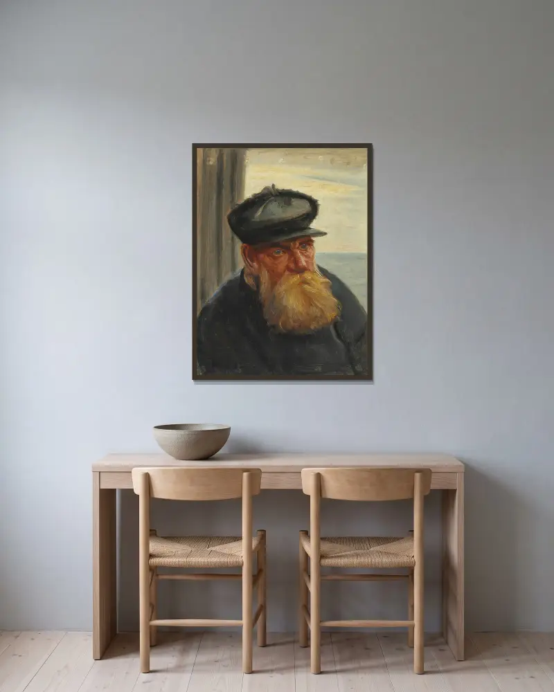 En skagensfisker med havet i baggrunden av Michael Ancher inramad på en vägg