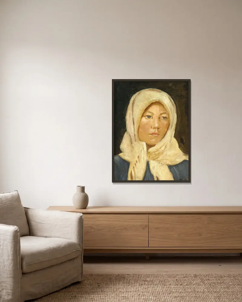 En ung skagenspige med tørklæde av Michael Ancher inramad på en vägg