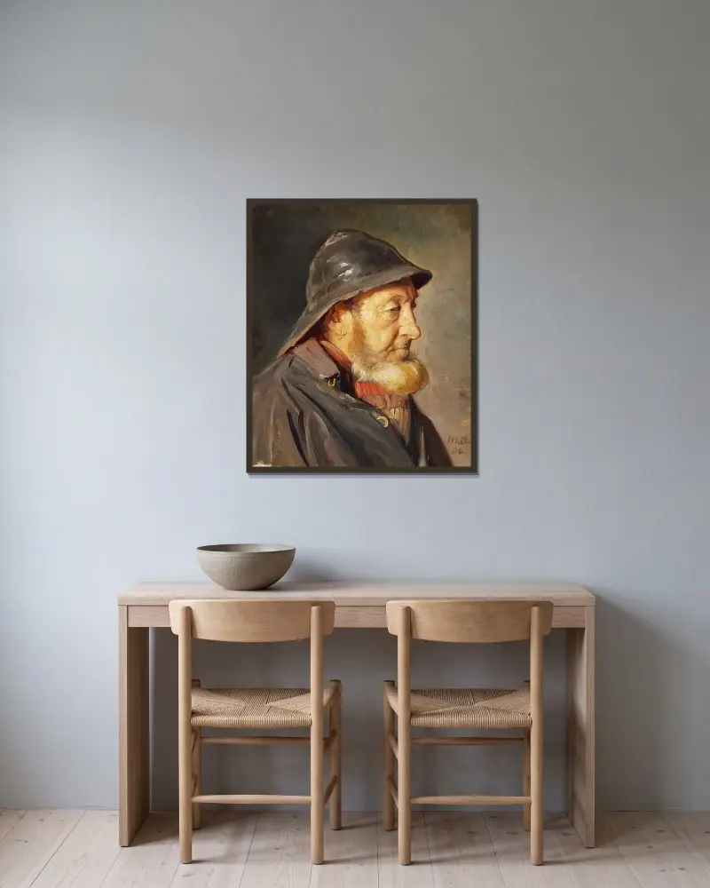 Fiskaren Ole Svendsen i profil med sydväst av Michael Ancher inramad på en vägg