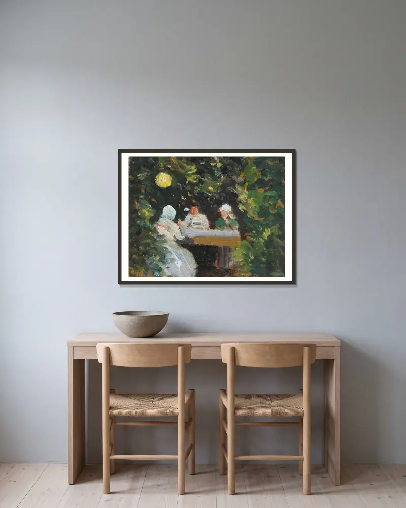 Samvaro i trädgården en sommarkväll under lampan av Michael Ancher inramad på en vägg