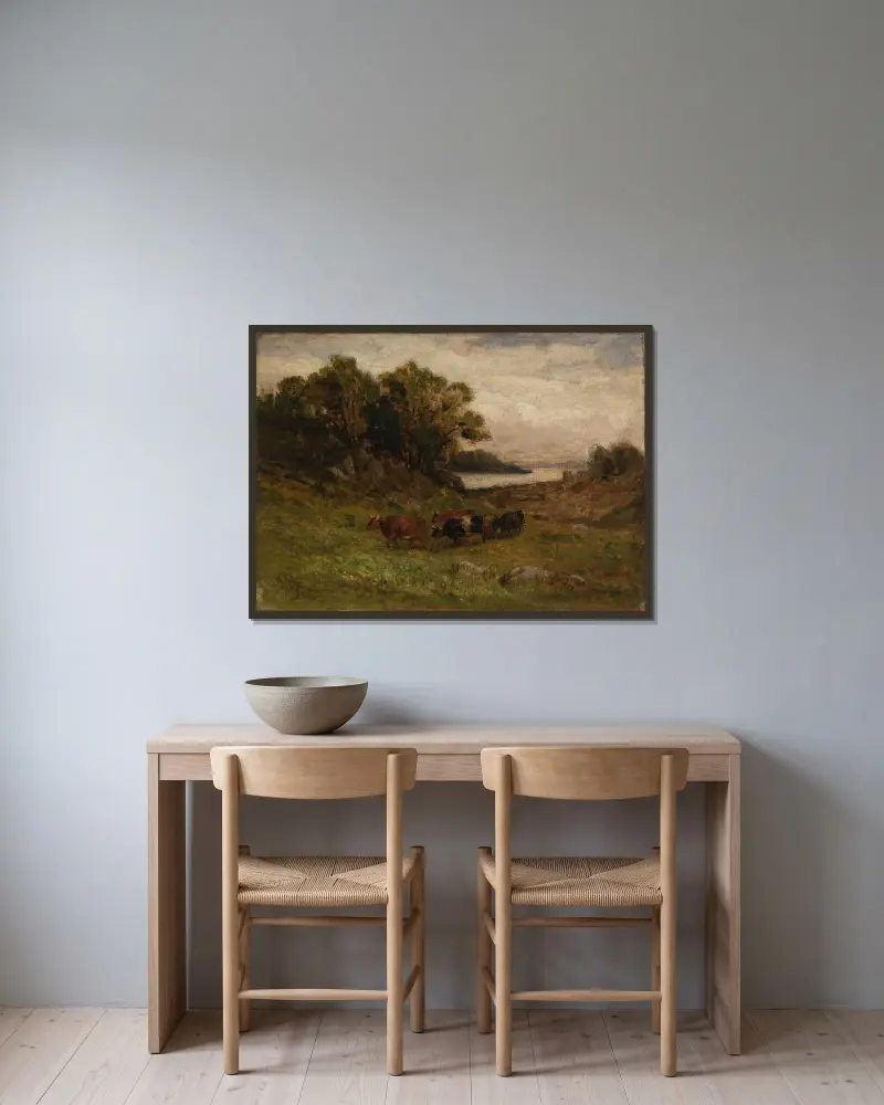 Utan titel (fem kor på bete med träd och flod i bakgrunden) av Edward Mitchell Bannister inramad på en vägg