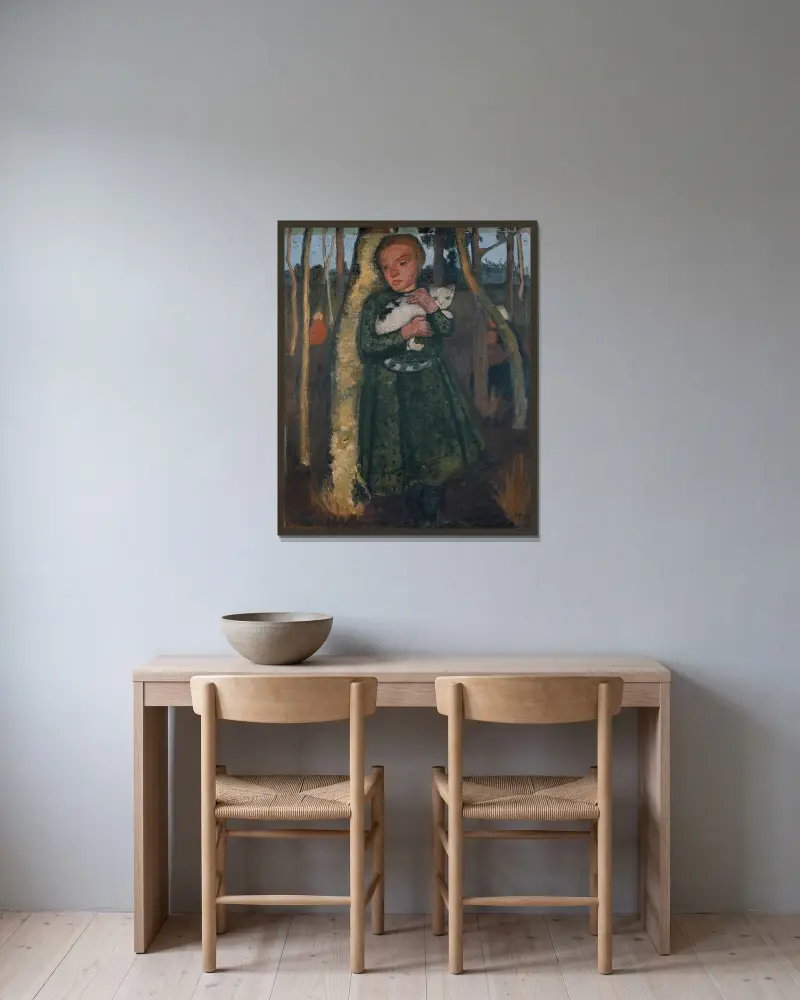 Mädchen im Birkenwald mit Katze von Paula Modersohn-Becker gerahmt an einer Wand