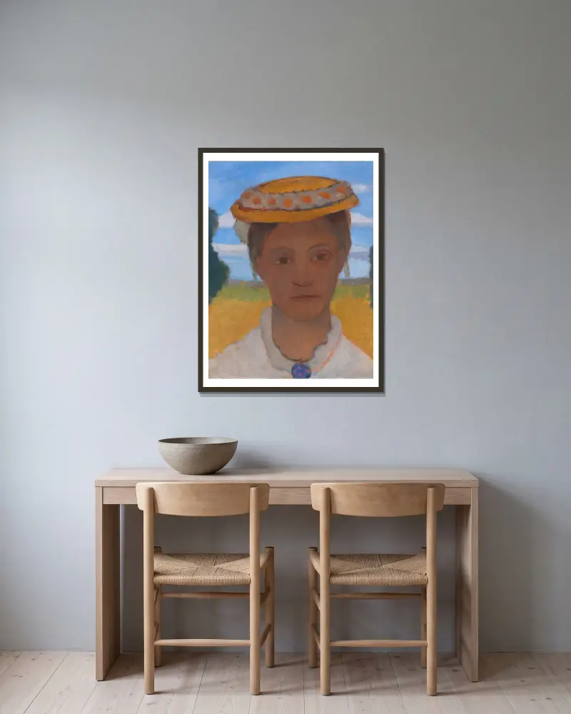 Kopf der Schwester Herma mit Marienblümchenkranz auf dem Hut av Paula Modersohn-Becker inramad på en vägg
