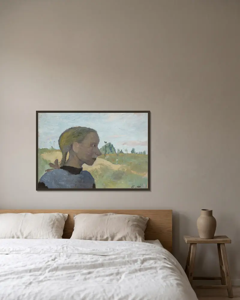 Portrait of a Girl av Paula Modersohn-Becker inramad på en vägg