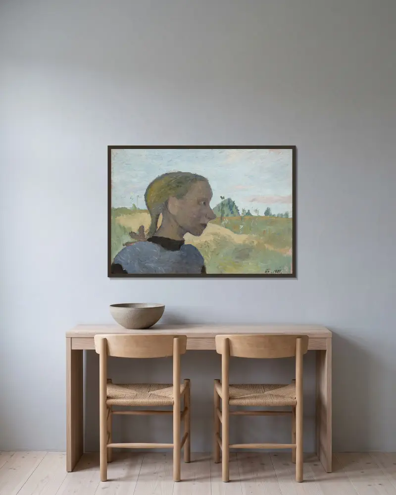 Portrait of a Girl av Paula Modersohn-Becker inramad på en vägg