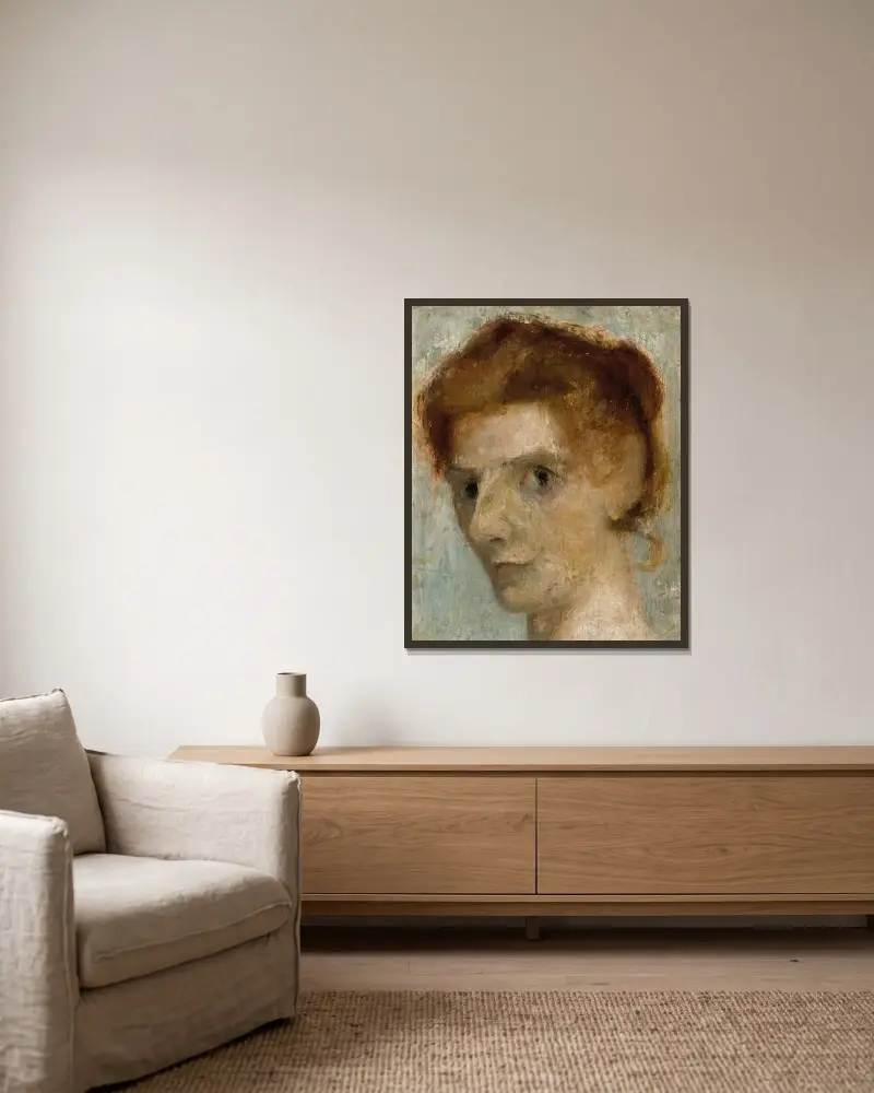 Selbstporträt von Paula Modersohn-Becker gerahmt an einer Wand