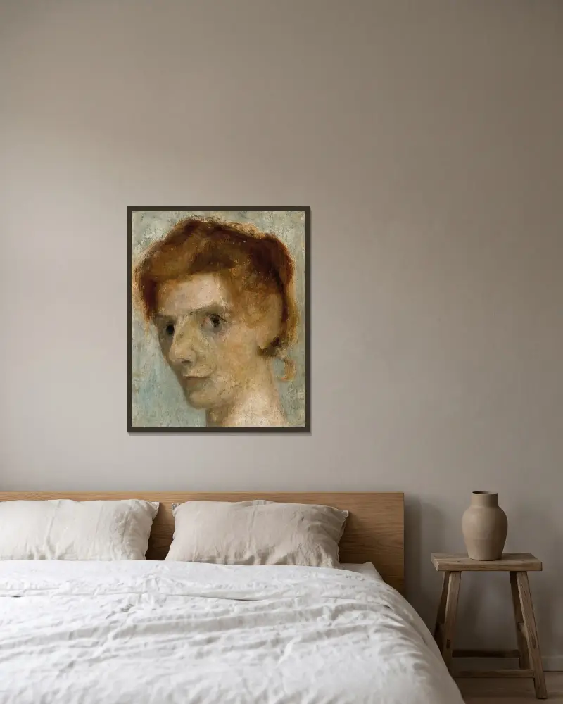Selbstporträt von Paula Modersohn-Becker gerahmt an einer Wand
