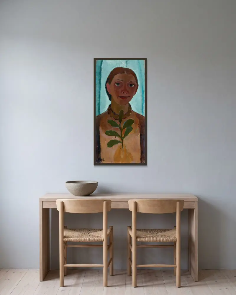 Selbstbildnis mit Kamelienzweig von Paula Modersohn-Becker gerahmt an einer Wand