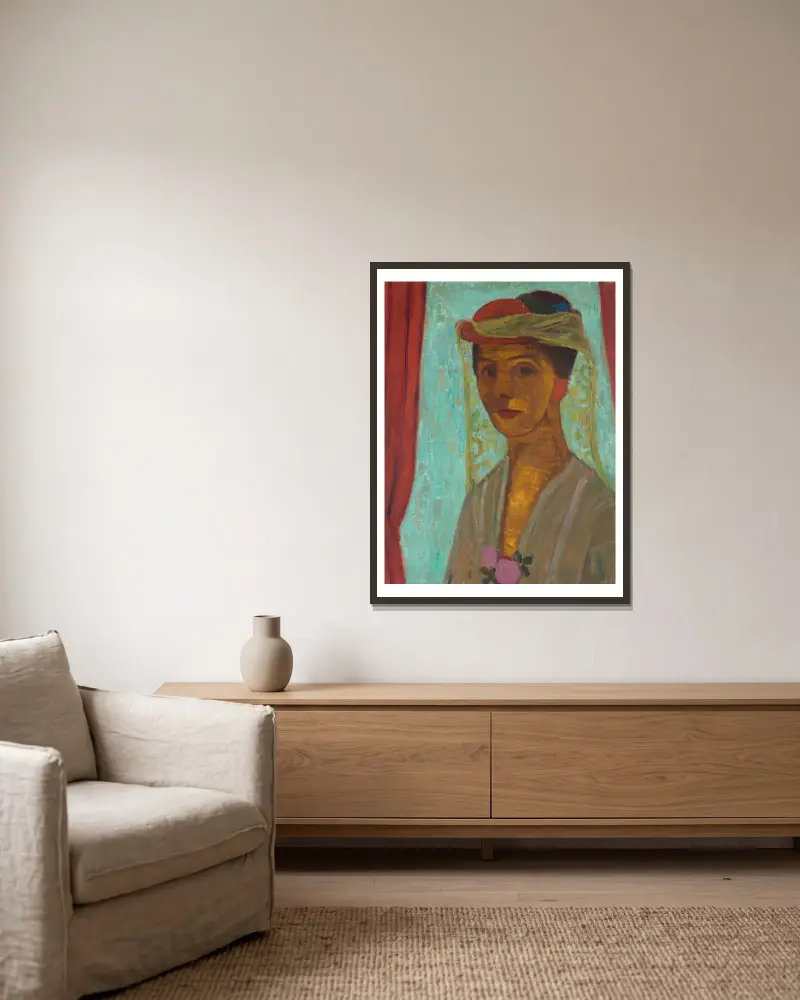 Selbstporträt mit Hut und Schleier von Paula Modersohn-Becker gerahmt an einer Wand