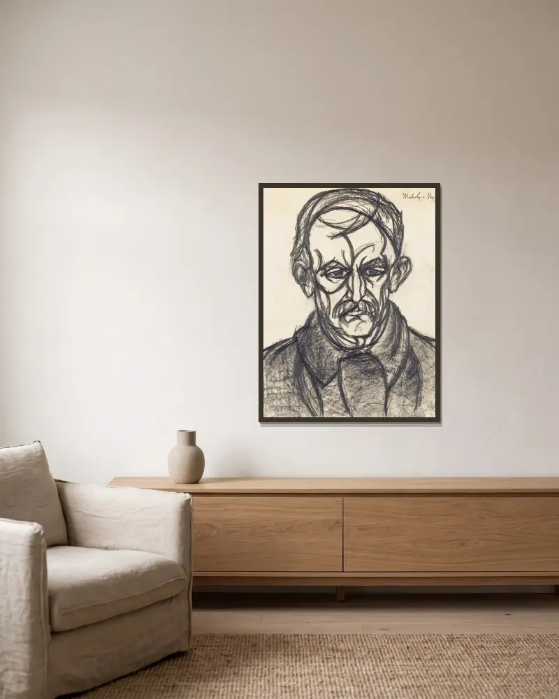 Portrét muže, László Moholy-Nagy v rámu na stěně