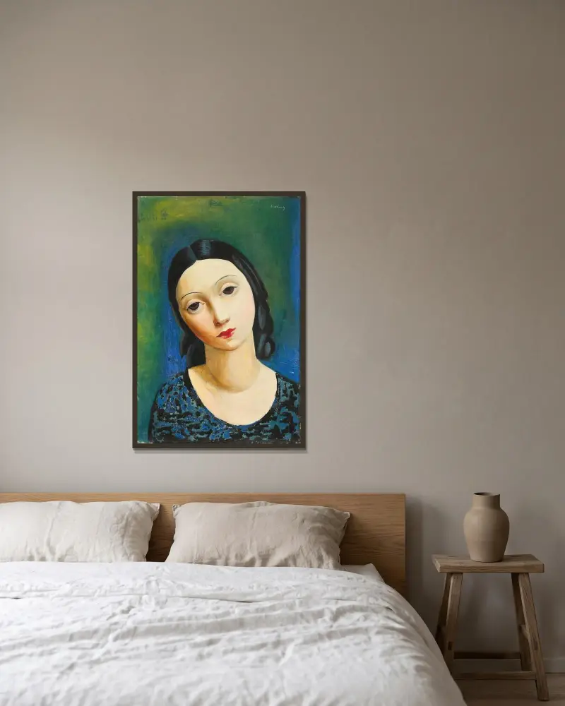 Mädchenkopf von Moïse Kisling gerahmt an einer Wand