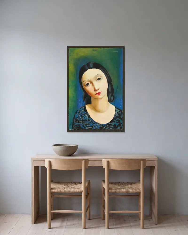 Mädchenkopf von Moïse Kisling gerahmt an einer Wand