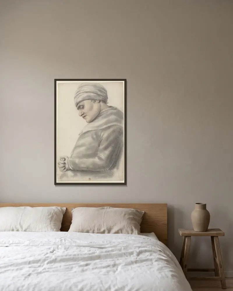 Femme de profil à gauche, les mains jointes sur le ventre, les yeux mi-clos, la tête enturbannée av Nicolas Lagneau inramad på en vägg