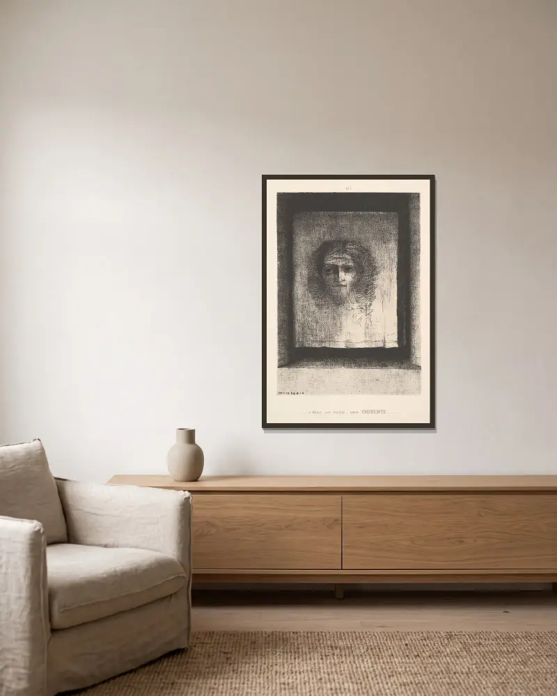 Ein Schleier, ein gedrucktes Bild von Odilon Redon gerahmt an einer Wand