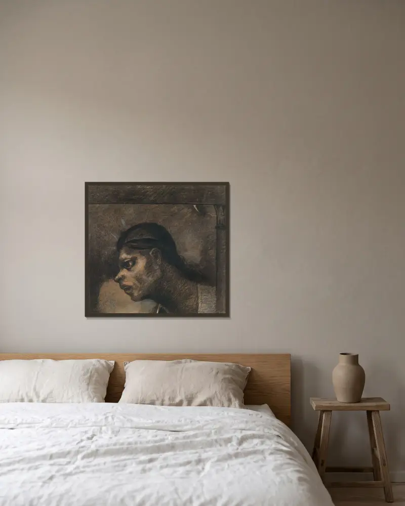 Ein Mann aus dem Volk von Odilon Redon gerahmt an einer Wand