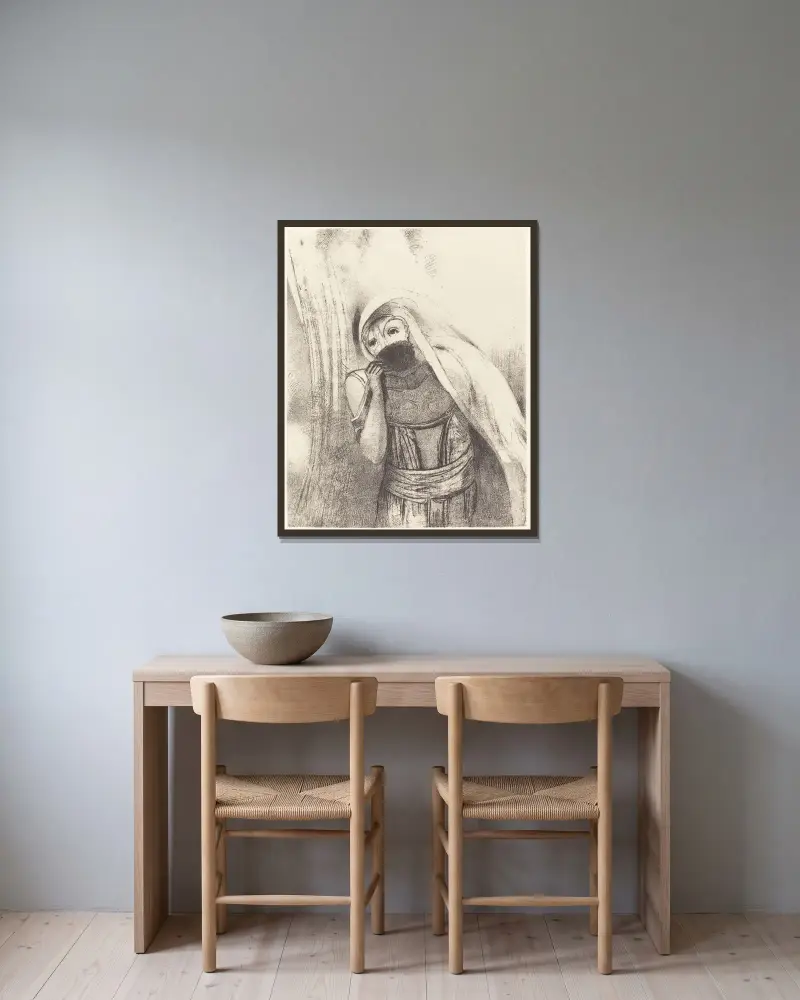 Hon drar ur sitt bröst en helt svart svamp och täcker den med kyssar av Odilon Redon inramad på en vägg