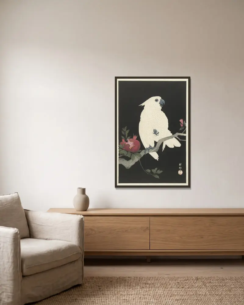 Cockatoo and pomegranate av Ohara Koson inramad på en vägg
