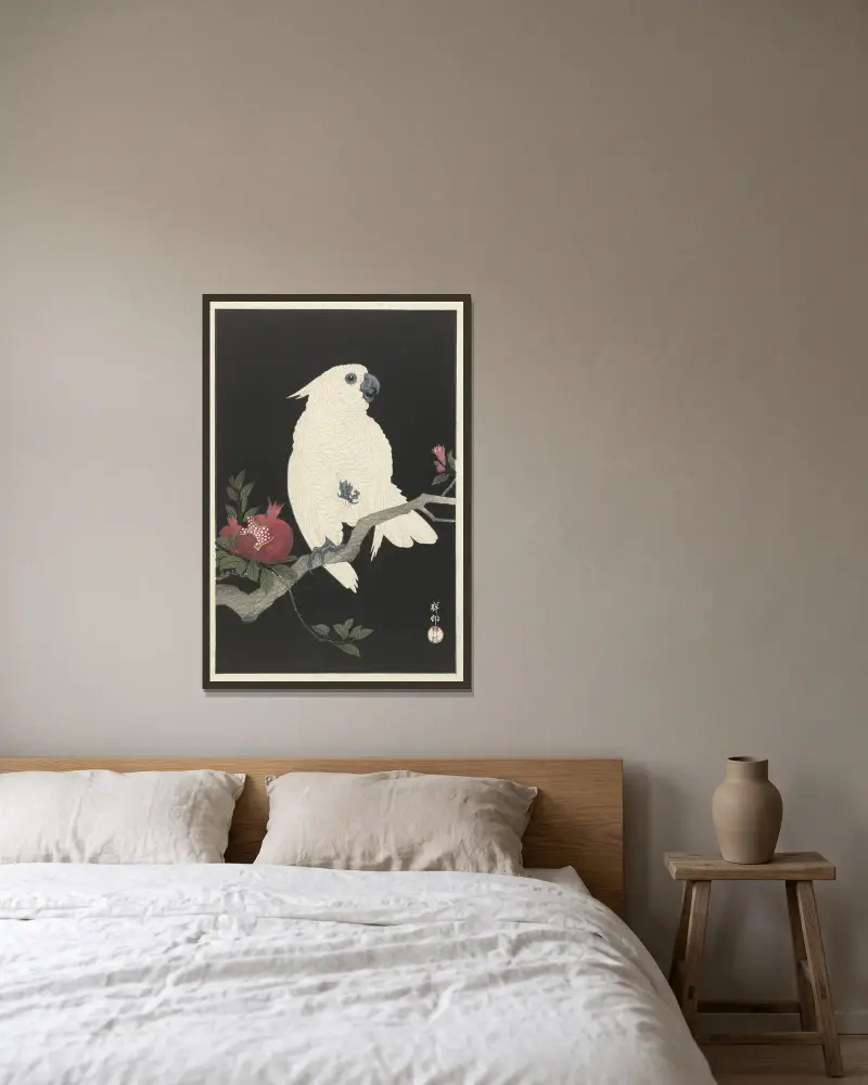 Cockatoo and pomegranate av Ohara Koson inramad på en vägg
