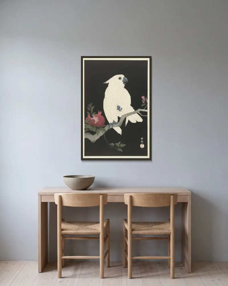Cockatoo and pomegranate av Ohara Koson inramad på en vägg