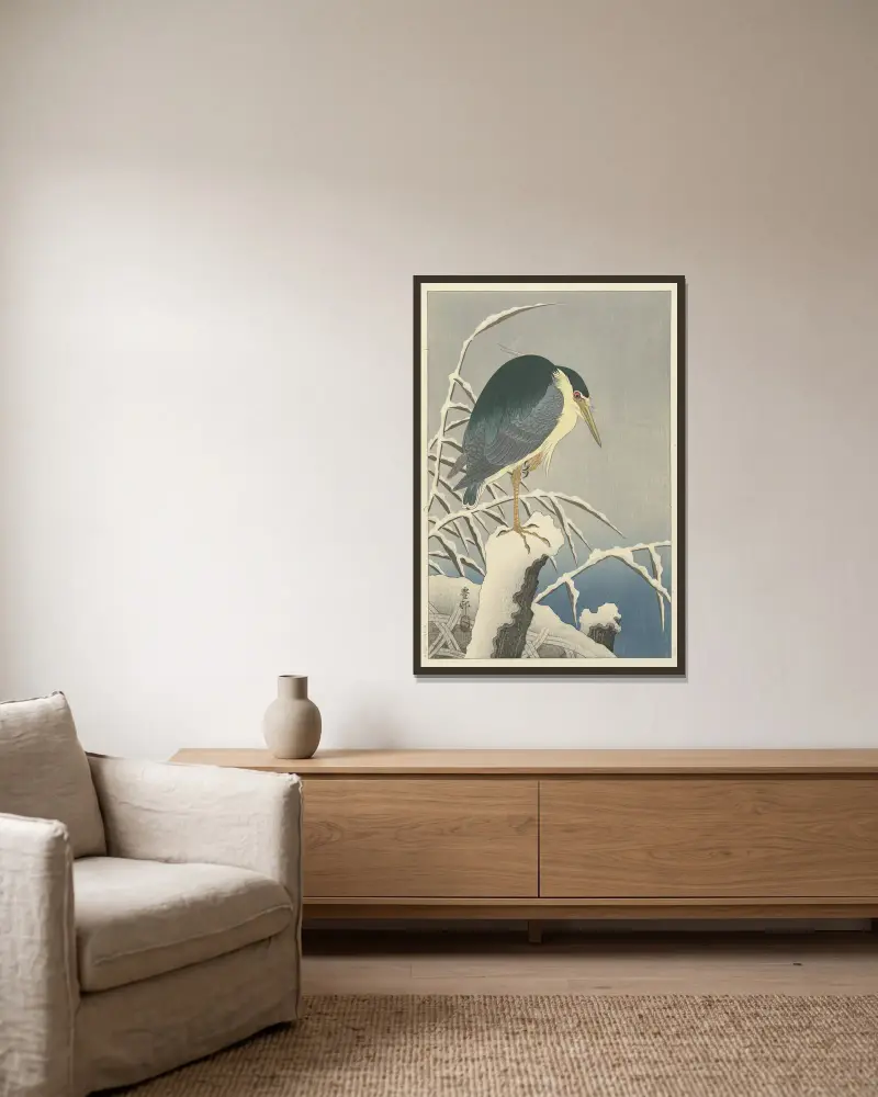 Reiher im Schnee von Ohara Koson gerahmt an einer Wand