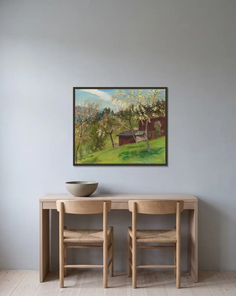 Blühende Bäume hinter Frau Windisch mit unserem Haus von Otto Modersohn gerahmt an einer Wand