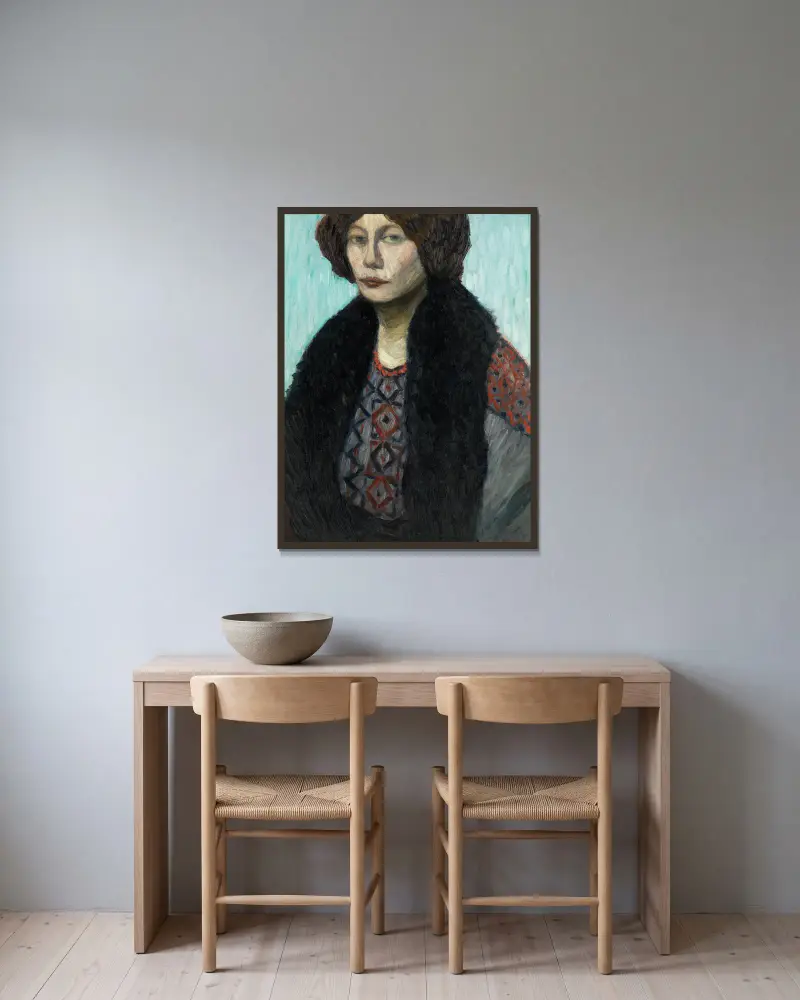 Porträt Louise Modersohn-Breling von Otto Modersohn gerahmt an einer Wand