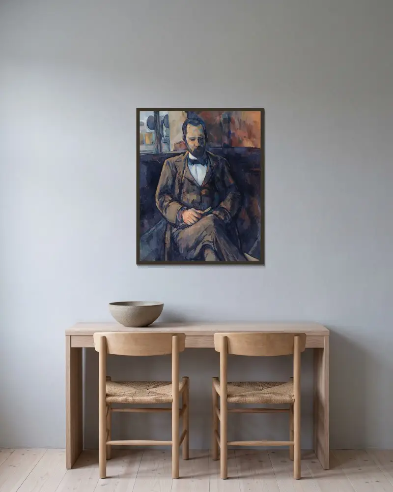 Portrait d’Ambroise Vollard av Paul Cézanne inramad på en vägg