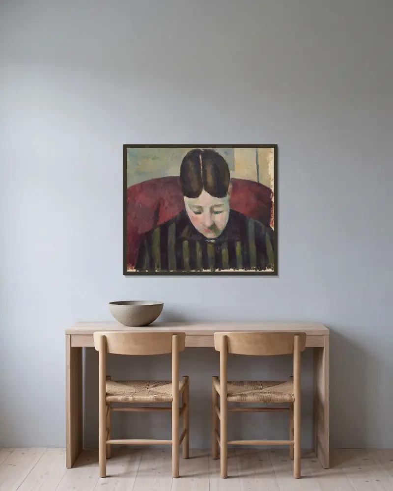 Portrait de Madame Cézanne av Paul Cézanne inramad på en vägg