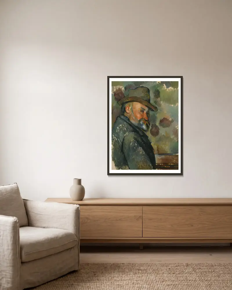 Selbstbildnis mit Hut von Paul Cézanne gerahmt an einer Wand