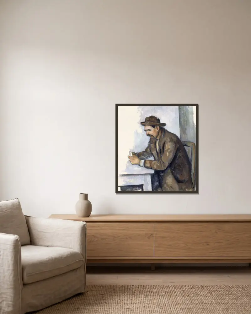 Der Kartenspieler von Paul Cézanne gerahmt an einer Wand