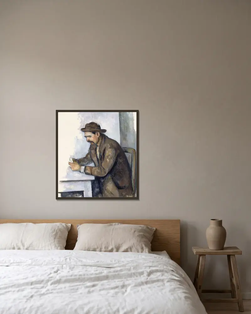 Der Kartenspieler von Paul Cézanne gerahmt an einer Wand
