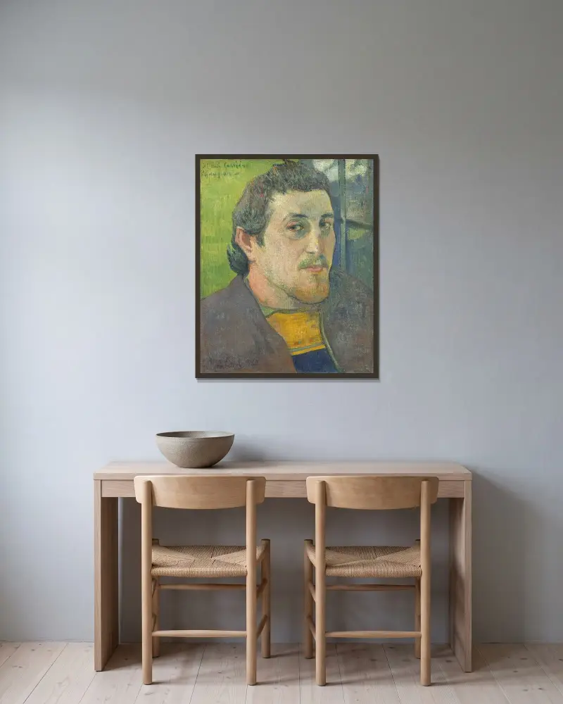 Self-Portrait Dedicated to Carrière av Paul Gauguin inramad på en vägg