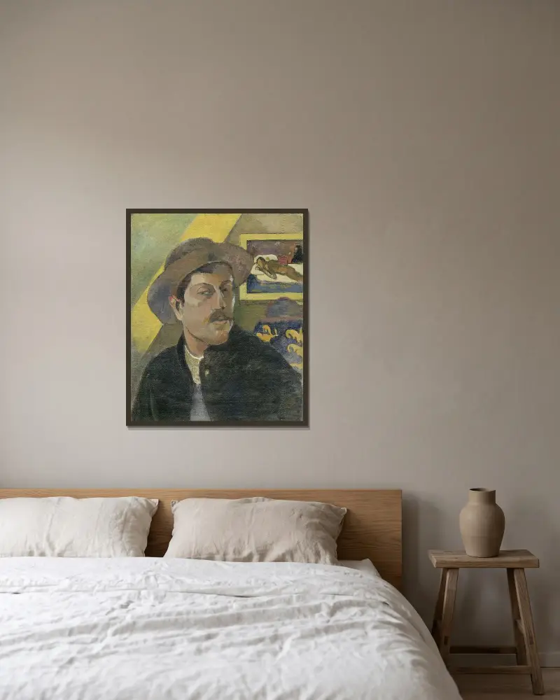 Self-portrait with a hat av Paul Gauguin inramad på en vägg