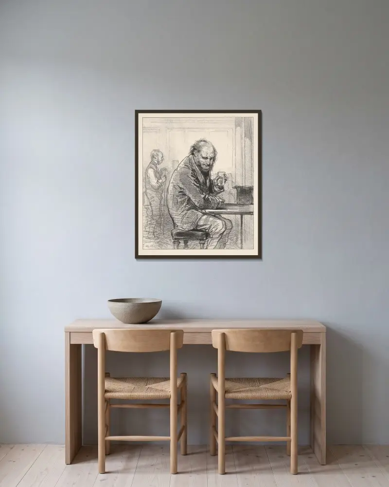 Mann am Tisch sitzend, ein Getränk haltend von Paul Gavarni gerahmt an einer Wand