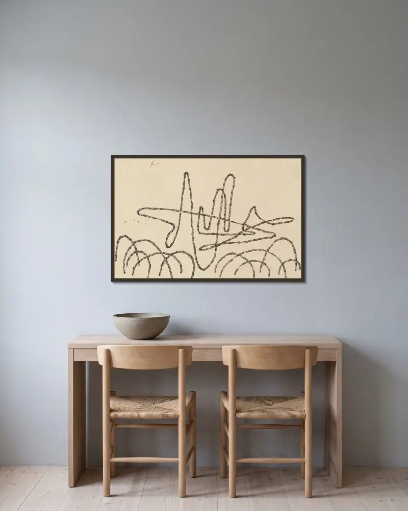 Von trockenen Zweigen von Paul Klee gerahmt an einer Wand